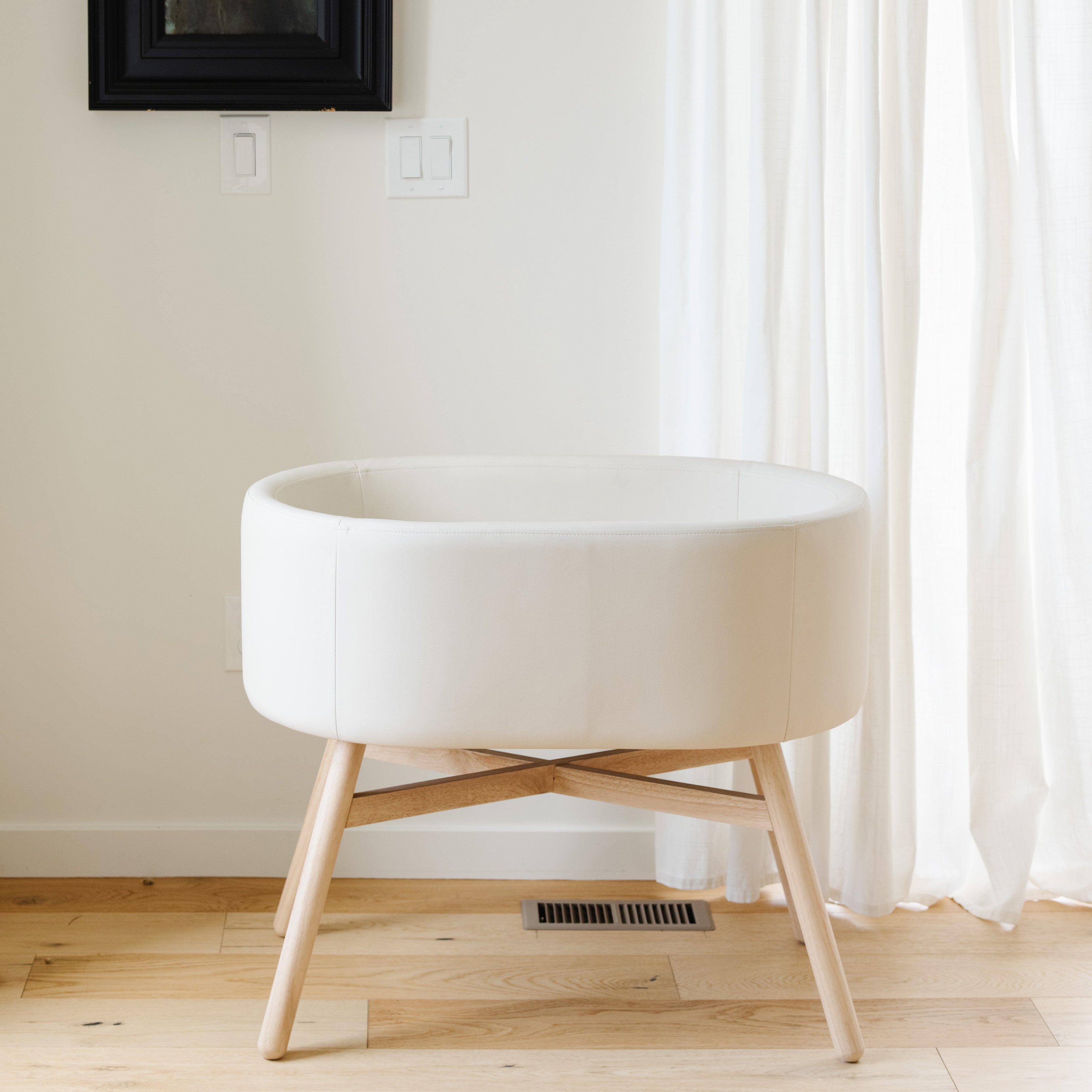 M26834GYLB,Babyletto,babyletto x GATHRE Capsule Bassinet in Ivory